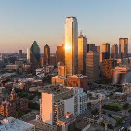 Aerial view of Dallas, Texas city skyline at sunset